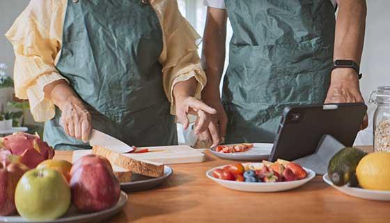 Couple preparing healthy meal together